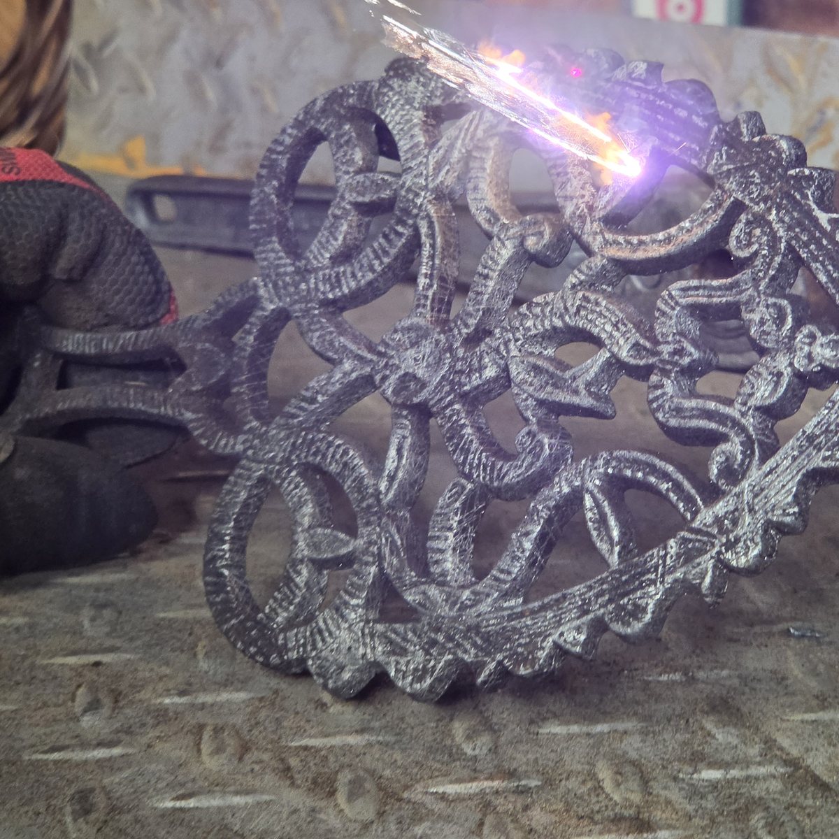 Laser cleaning rust off a cast iron trivet